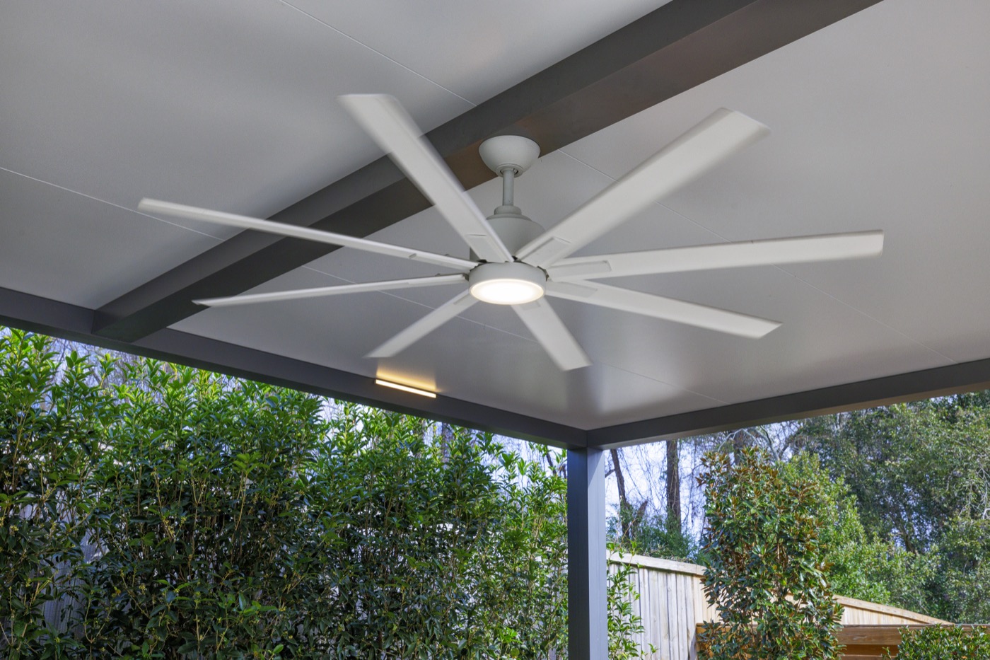 Covered pergola with ceiling fan over an outdoor living space, Florida